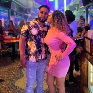 Bright pink corset sweater dress